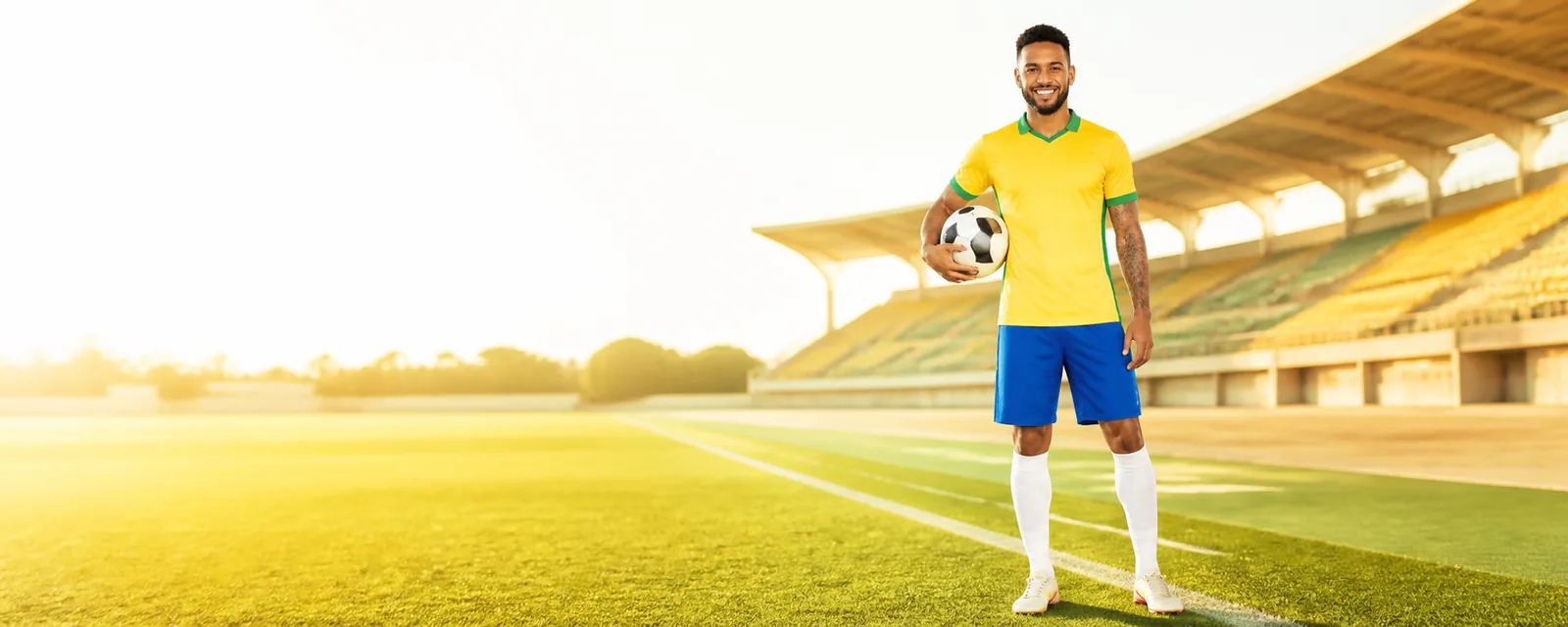 Jogador brasileiro em um estádio iluminado